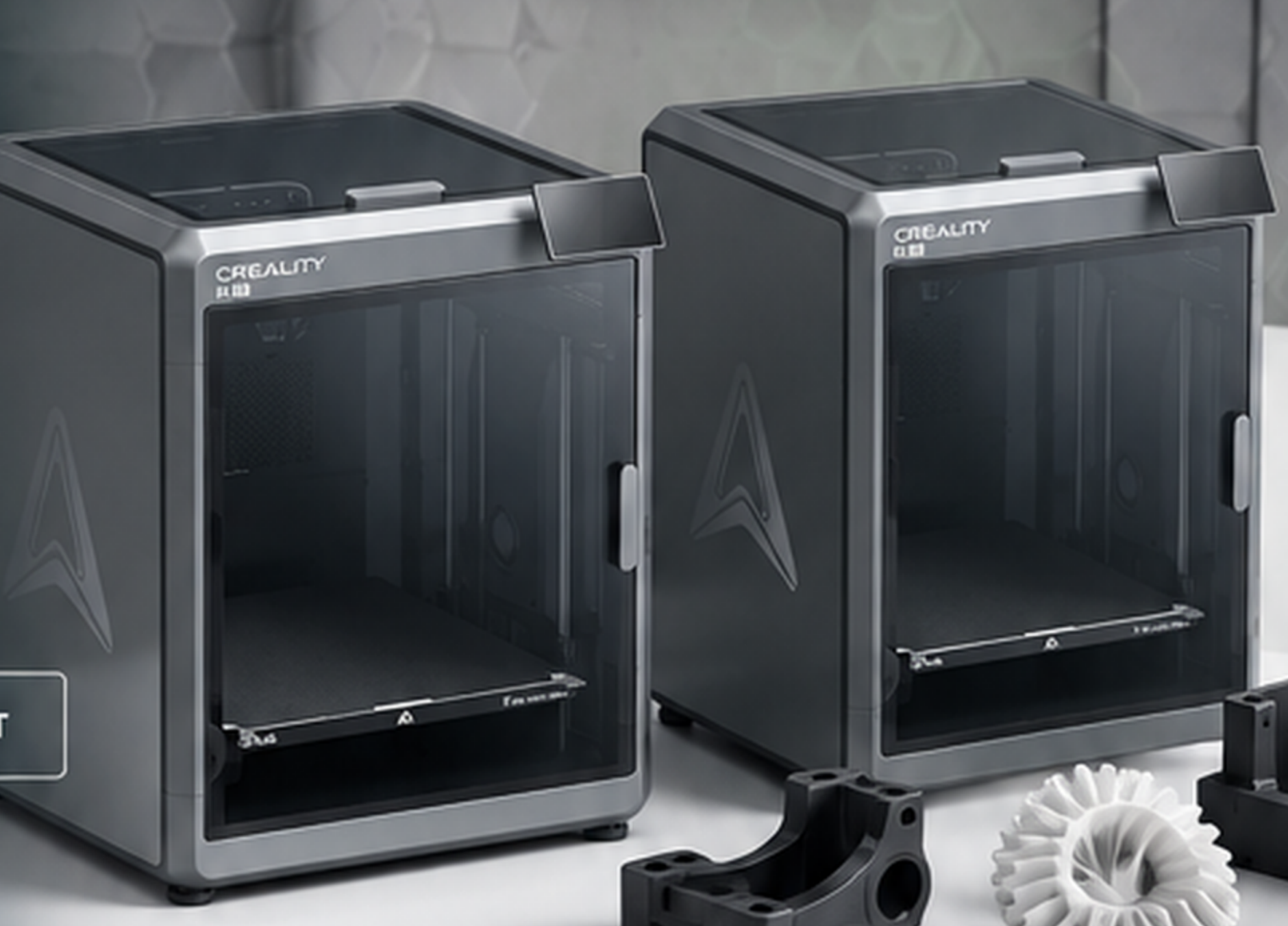 Two Creality K2 3D printers with printed components